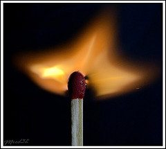 lit match with flame