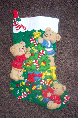 felt Christmas stocking showing 3 teddy bears decorating a pine tree