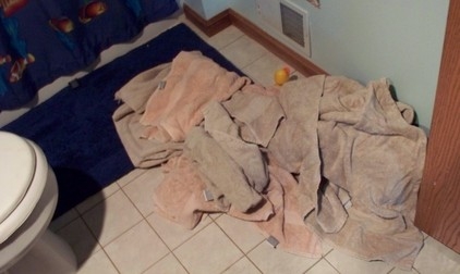 floortowels towels on bathroom flooor