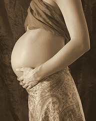side view of pregnant belly