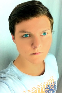 boy looking at camera again, photo edited to make skin smoother