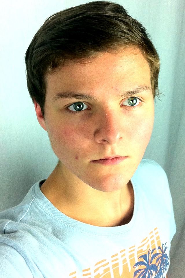 boy looking at camera seriously